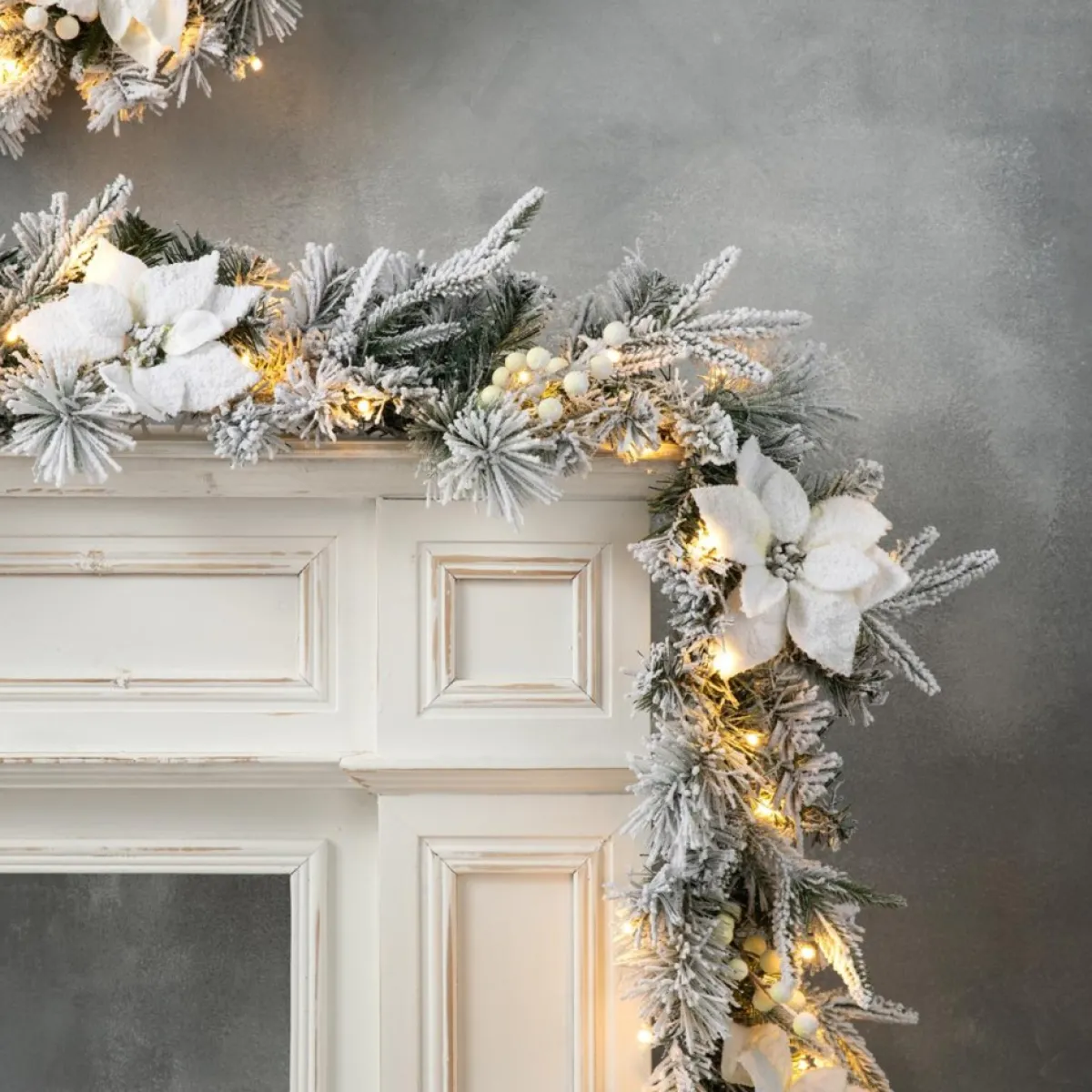 glitzhome__prelit_snow_flocked_greenery_pine_poinsettia_garland_3.webp Glitzhome Wreaths, Garlands & More | 9' Pre-Lit Snow Flocked Greenery Pine Poinsettia Garland